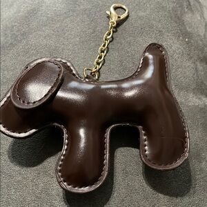 Brown Leather Dog-Shaped Toy Accessory with Gold Clasp